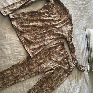 Under Armour women’s camo print thermals. New without tags.